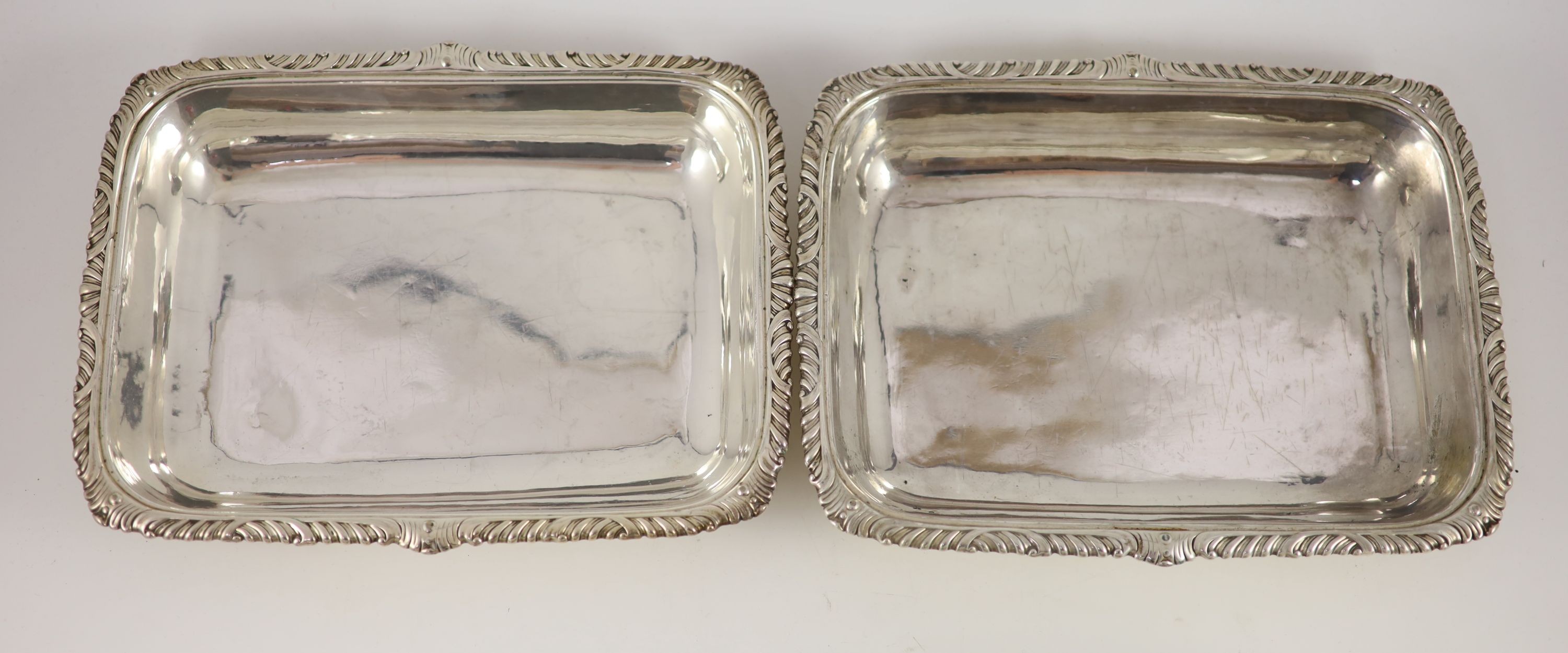 A pair of George III silver entrée dishes and covers, James Kirkby, Waterhouse & Co, Sheffield